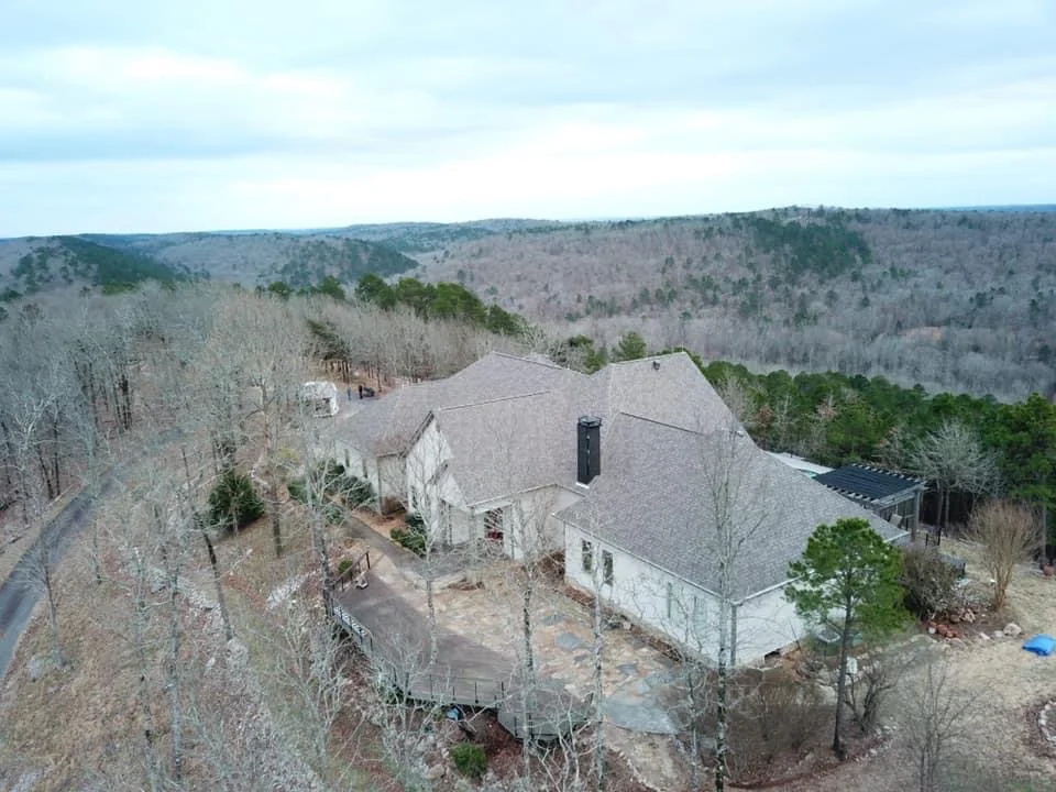An aerial view of a home and shingle roof from CAR’s residential portfolio
